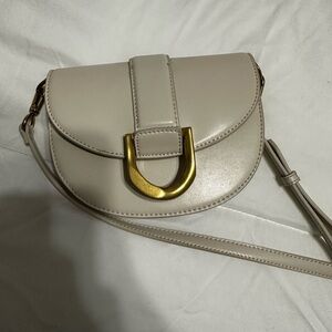 Elegant Cream Crossbody Bag with Gold Accent
